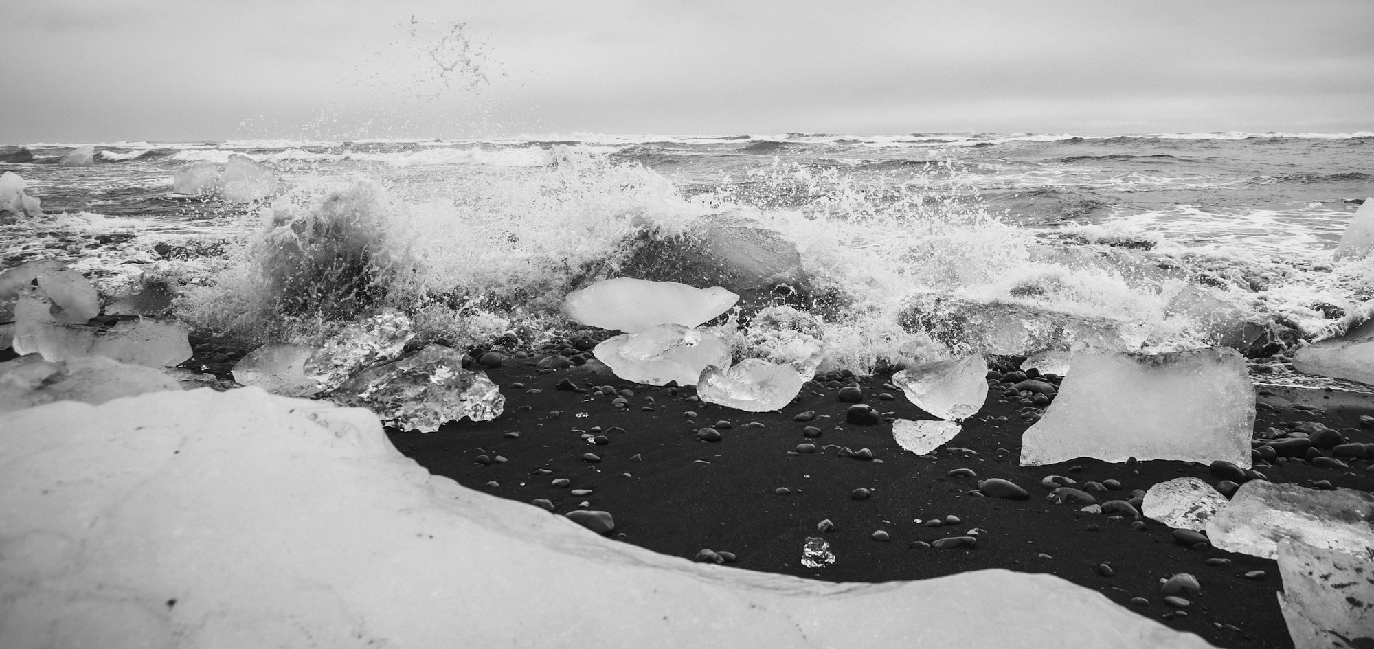 Giant ice blocks detached from icebergs on the coast of an Icelandic beach.